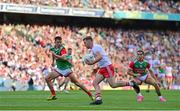 11 September 2021; Michael O’Neill of Tyrone in action against Enda Hession and Oisín Mullin of Mayo during the GAA Football All-Ireland Senior Championship Final match between Mayo and Tyrone at Croke Park in Dublin. Photo by Brendan Moran/Sportsfile