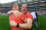 11 September 2021; Tyrone joint-manager Feargal Logan, right, celebrates with Tyrone team doctor Michael Logan after their side's victory in the GAA Football All-Ireland Senior Championship Final match between Mayo and Tyrone at Croke Park in Dublin. Photo by Piaras Ó Mídheach/Sportsfile