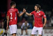 14 September 2021; Colm Horgan, right, and Lewis Banks of Sligo Rovers celebrate at the final whistle after their side's victory in the SSE Airtricity League Premier Division match between Sligo Rovers and Dundalk at The Showgrounds in Sligo. Photo by Seb Daly/Sportsfile