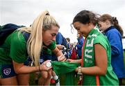 15 September 2021; Savannah McCarthy signs a Republic of Ireland jersey for Natalie Kayanan-Ranallo of Rosemount Mulvey FC following a Republic of Ireland training session at the FAI National Training Centre in Abbotstown, Dublin. Photo by Stephen McCarthy/Sportsfile