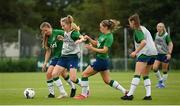 15 September 2021; Aoibheann Clancy is tackled by Kyra Carusa, left, and Katie McCabe during a Republic of Ireland training session at the FAI National Training Centre in Abbotstown, Dublin. Photo by Stephen McCarthy/Sportsfile