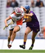 12 September 2021; Eimear Smyth of Armagh and Clodagh Jackman of Wexford during the All-Ireland Premier Junior Camogie Championship Final match between Armagh and Wexford at Croke Park in Dublin. Photo by Ben McShane/Sportsfile