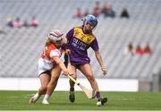 12 September 2021; Clodagh Jackman of Wexford and Eimear Smyth of Armagh during the All-Ireland Premier Junior Camogie Championship Final match between Armagh and Wexford at Croke Park in Dublin. Photo by Ben McShane/Sportsfile