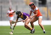 12 September 2021; Aoife Dunne of Wexford and Bernie Murray of Armagh during the All-Ireland Premier Junior Camogie Championship Final match between Armagh and Wexford at Croke Park in Dublin. Photo by Ben McShane/Sportsfile