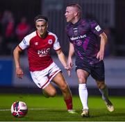 17 September 2021; Lorcan Fitzgerald of Wexford in action against Matty Smith of St Patrick's Athletic during the extra.ie FAI Cup Quarter-Final match between St Patrick's Athletic and Wexford at Richmond Park in Dublin. Photo by Ben McShane/Sportsfile