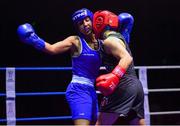 17 September 2021; Sara Haghighat-Jo of St Brigid's Boxing Club in Edenderry, Offaly, left, and Clodagh McComiskey of Gilford Boxing Club, Down, during their 54kg bout during the IABA National Championships Preliminaries at the National Boxing Stadium in Dublin. Photo by Piaras Ó Mídheach/Sportsfile