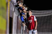 17 September 2021; Darragh Burns of St Patrick's Athletic stands for the selfie with a young supporter after his side's victory in the extra.ie FAI Cup Quarter-Final match between St Patrick's Athletic and Wexford at Richmond Park in Dublin. Photo by Ben McShane/Sportsfile