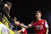 17 September 2021; Jak Hickman of St Patrick's Athletic is congratulated by a supporter after his side's victory in the extra.ie FAI Cup Quarter-Final match between St Patrick's Athletic and Wexford at Richmond Park in Dublin. Photo by Ben McShane/Sportsfile
