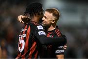 17 September 2021; Roland Idowu of Bohemians celebrates after scoring his side's fourth goal with team-mate Keith Ward, right, during the extra.ie FAI Cup Quarter-Final match between Bohemians and Maynooth University Town at Dalymount Park in Dublin. Photo by Stephen McCarthy/Sportsfile