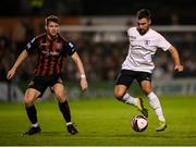 17 September 2021; Conor Delahunty of Maynooth University Town in action against Rory Feely of Bohemians during the extra.ie FAI Cup Quarter-Final match between Bohemians and Maynooth University Town at Dalymount Park in Dublin. Photo by Stephen McCarthy/Sportsfile