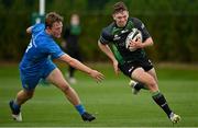18 September 2021; Cathal Forde of Connacht evades the tackle of Leinster's Conor Gibney during the Development Interprovincial match between Leinster XV and Connacht XV at the IRFU High Performance Centre, on the Sport Ireland Campus in Dublin. Photo by Seb Daly/Sportsfile