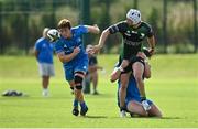 18 September 2021; Mack Hansen of Connacht off-loads as he is tackled by Michael McCormack of Leinster during the Development Interprovincial match between Leinster XV and Connacht XV at the IRFU High Performance Centre, on the Sport Ireland Campus in Dublin. Photo by Seb Daly/Sportsfile
