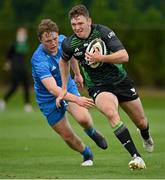 18 September 2021; Cathal Forde of Connacht evades the tackle of Leinster's Conor Gibney during the Development Interprovincial match between Leinster XV and Connacht XV at the IRFU High Performance Centre, on the Sport Ireland Campus in Dublin. Photo by Seb Daly/Sportsfile