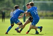 18 September 2021; Peter Sullivan of Connacht is tackled by Dylan Ryan, left, and Conor Gibney of Leinster during the Development Interprovincial match between Leinster XV and Connacht XV at the IRFU High Performance Centre, on the Sport Ireland Campus in Dublin. Photo by Seb Daly/Sportsfile