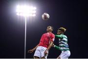 18 September 2021; Ryan De Vries of Sligo Rovers in action against Barry Cotter of Shamrock Rovers during the SSE Airtricity League Premier Division match between Sligo Rovers and Shamrock Rovers at The Showgrounds in Sligo. Photo by Stephen McCarthy/Sportsfile
