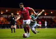 18 September 2021; Greg Bolger of Sligo Rovers in action against Richie Towell of Shamrock Rovers during the SSE Airtricity League Premier Division match between Sligo Rovers and Shamrock Rovers at The Showgrounds in Sligo. Photo by Stephen McCarthy/Sportsfile