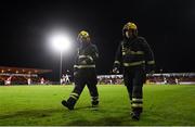 18 September 2021; Members of the Sligo Fire Department patrol the sideline in front of the Shamrock Rovers supporters during the SSE Airtricity League Premier Division match between Sligo Rovers and Shamrock Rovers at The Showgrounds in Sligo. Photo by Stephen McCarthy/Sportsfile