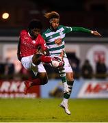 18 September 2021; Walter Figueira of Sligo Rovers in action against Barry Cotter of Shamrock Rovers during the SSE Airtricity League Premier Division match between Sligo Rovers and Shamrock Rovers at The Showgrounds in Sligo. Photo by Stephen McCarthy/Sportsfile