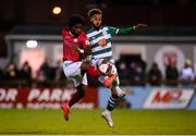 18 September 2021; Walter Figueira of Sligo Rovers in action against Barry Cotter of Shamrock Rovers during the SSE Airtricity League Premier Division match between Sligo Rovers and Shamrock Rovers at The Showgrounds in Sligo. Photo by Stephen McCarthy/Sportsfile