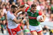 11 September 2021; Aidan O'Shea of Mayo is tackled by Ronan McNamee of Tyrone during the GAA Football All-Ireland Senior Championship Final match between Mayo and Tyrone at Croke Park in Dublin. Photo by Ramsey Cardy/Sportsfile