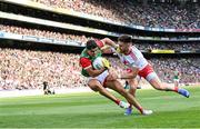 11 September 2021; Tommy Conroy of Mayo is tackled by Pádraig Hampsey of Tyrone during the GAA Football All-Ireland Senior Championship Final match between Mayo and Tyrone at Croke Park in Dublin. Photo by Ramsey Cardy/Sportsfile