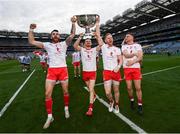 11 September 2021; Tyrone players, from left, Ronan McNamee, Cathal McShane, Frank Burns and Niall Kelly with the Sam Maguire cup after the GAA Football All-Ireland Senior Championship Final match between Mayo and Tyrone at Croke Park in Dublin. Photo by Ramsey Cardy/Sportsfile