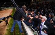 18 September 2021; Trainer Eoin McKenna celebrates with spectators after sending out Susie Sapphire to win the 2021 Boylesports Irish Greyhound Derby Final at Shelbourne Park in Dublin. Photo by Harry Murphy/Sportsfile