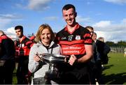 19 September 2021; Kevin McDonald of Mount Leinster Rangers and his mother, Helen, with the cup after the Carlow Senior County Hurling Championship Final match between Mount Leinster Rangers and St Mullins at Netwatch Cullen Park in Carlow. Photo by Ben McShane/Sportsfile