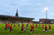20 September 2021; Derry City players warm-up before the SSE Airtricity League Premier Division match between Bohemians and Derry City at Dalymount Park in Dublin. Photo by Seb Daly/Sportsfile