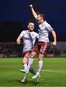 20 September 2021; Liam Burt of Bohemians, right, celebrates with team-mate Andy Lyons after scoring their side's first goal during the SSE Airtricity League Premier Division match between Bohemians and Derry City at Dalymount Park in Dublin. Photo by Seb Daly/Sportsfile