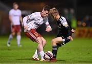 20 September 2021; Ali Coote of Bohemians in action against Ciaron Harkin of Derry City during the SSE Airtricity League Premier Division match between Bohemians and Derry City at Dalymount Park in Dublin. Photo by Seb Daly/Sportsfile