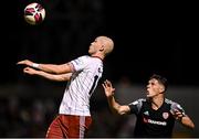20 September 2021; Georgie Kelly of Bohemians in action against Eoin Toal of Derry City during the SSE Airtricity League Premier Division match between Bohemians and Derry City at Dalymount Park in Dublin. Photo by Seb Daly/Sportsfile