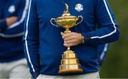 21 September 2021; Team captain Padraig Harrington carries the Ryder Cup trophy during a Team Europe squad photo session prior to the Ryder Cup 2021 Matches at Whistling Straits in Kohler, Wisconsin, USA. Photo by Tom Russo/Sportsfile