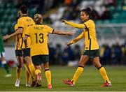 21 September 2021; Mary Fowler of Australia, right, is congratulated by team-mates after scoring their side's first goal during the women's international friendly match between Republic of Ireland and Australia at Tallaght Stadium in Dublin. Photo by Seb Daly/Sportsfile