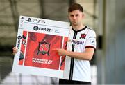 22 September 2021; SSE Airtricity League FIFA 22 Club Packs are back. Featuring the individual club crest of all 10 Premier Division teams, these exclusive sleeves will be available to download free from https://www.ea.com/games/fifa/fifa-22 when the game launches Friday, 1st October! Will Patching of Dundalk during the launch at Sport Ireland National Indoor Arena at the Sport Ireland Campus in Dublin. Photo by Stephen McCarthy/Sportsfile