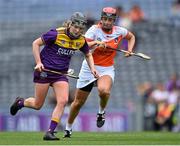 12 September 2021; Ailis Neville of Wexford in action against Gemma McCann of Armagh during the All-Ireland Premier Junior Camogie Championship Final match between Armagh and Wexford at Croke Park in Dublin. Photo by Piaras Ó Mídheach/Sportsfile