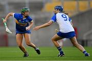 21 August 2021; Róisín Howard of Tipperary in action against Shona Curran of Waterford during the All-Ireland Senior Camogie Championship Quarter-Final match between Tipperary and Waterford at Páirc Uí Chaoimh in Cork. Photo by Piaras Ó Mídheach/Sportsfile