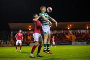 18 September 2021; Rory Gaffney of Shamrock Rovers in action against Garry Buckley of Sligo Rovers during the SSE Airtricity League Premier Division match between Sligo Rovers and Shamrock Rovers at The Showgrounds in Sligo. Photo by Stephen McCarthy/Sportsfile