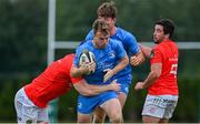 24 September 2021; David Hawkshaw of Leinster is tackled by Cian Hurley of Munster during the Development Interprovincial match between Leinster XV and Munster XV at the IRFU High Performance Centre at the Sport Ireland Campus in Dublin.  Photo by Brendan Moran/Sportsfile