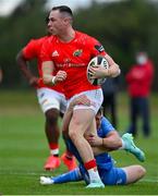 24 September 2021; Seán French of Munster is tackled by David Hawkshaw of Leinster during the Development Interprovincial match between Leinster XV and Munster XV at the IRFU High Performance Centre at the Sport Ireland Campus in Dublin.  Photo by Brendan Moran/Sportsfile