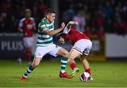 24 September 2021; Dylan Watts of Shamrock Rovers in action against Matty Smith of St Patrick's Athletic during the SSE Airtricity League Premier Division match between St Patrick's Athletic and Shamrock Rovers at Richmond Park in Dublin. Photo by Seb Daly/Sportsfile