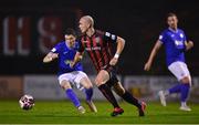 24 September 2021; Georgie Kelly of Bohemians in action against Johnny Dunleavy of Finn Harps during the SSE Airtricity League Premier Division match between Bohemians and Finn Harps at Dalymount Park in Dublin. Photo by Piaras Ó Mídheach/Sportsfile