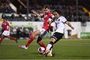24 September 2021; Han Jeongwoo of Dundalk has a shot on goal despite the attention of Lewis Banks of Sligo Rovers during the SSE Airtricity League Premier Division match between Dundalk and Sligo Rovers at Oriel Park in Dundalk, Louth. Photo by Ben McShane/Sportsfile