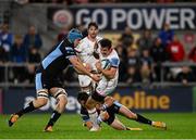 24 September 2021; Billy Burns of Ulster is tackled by George Horne, right, and Scott Cummings of Glasgow Warriors during the United Rugby Championship match between Ulster and Glasgow Warriors at Kingspan Stadium in Belfast. Photo by Harry Murphy/Sportsfile