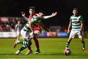24 September 2021; Danny Mandroiu of Shamrock Rovers in action against Alfie Lewis of St Patrick's Athletic during the SSE Airtricity League Premier Division match between St Patrick's Athletic and Shamrock Rovers at Richmond Park in Dublin. Photo by Sam Barnes/Sportsfile