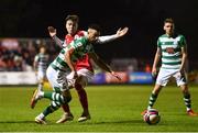 24 September 2021; Danny Mandroiu of Shamrock Rovers in action against Alfie Lewis of St Patrick's Athletic during the SSE Airtricity League Premier Division match between St Patrick's Athletic and Shamrock Rovers at Richmond Park in Dublin. Photo by Sam Barnes/Sportsfile