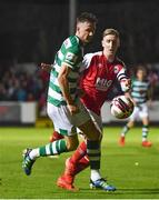 24 September 2021; Ronan Finn of Shamrock Rovers in action against Ian Bermingham of St Patrick's Athletic during the SSE Airtricity League Premier Division match between St Patrick's Athletic and Shamrock Rovers at Richmond Park in Dublin. Photo by Sam Barnes/Sportsfile