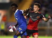 24 September 2021; Junior Quitirna of Waterford in action against Darragh Markey of Drogheda United during the SSE Airtricity League Premier Division match between Waterford and Drogheda United at RSC in Waterford. Photo by Michael P Ryan/Sportsfile