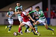 24 September 2021; Matty Smith of St Patrick's Athletic in action against Sean Gannon of Shamrock Rovers during the SSE Airtricity League Premier Division match between St Patrick's Athletic and Shamrock Rovers at Richmond Park in Dublin. Photo by Sam Barnes/Sportsfile