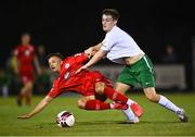 24 September 2021; John Ross Wilson of Shelbourne is tackled by Zak O'Neill of Cabinteely during the SSE Airtricity League First Division match between Cabinteely and Shelbourne at Stradbrook in Blackrock, Dublin. Photo by David Fitzgerald/Sportsfile